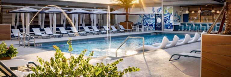 jw savjw compass pool lounge37903 14703 Pano Hor 1 768x256